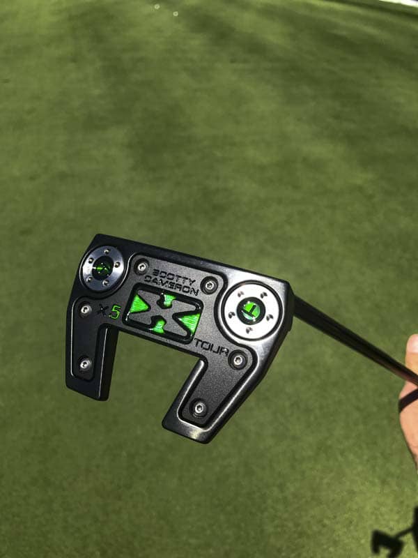 Futura X5 in Tour black with translucent emerald green.