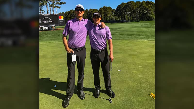 Dom Bozzelli and Scotty Cameron Tour rep Kelley Moser. Who wore it better?