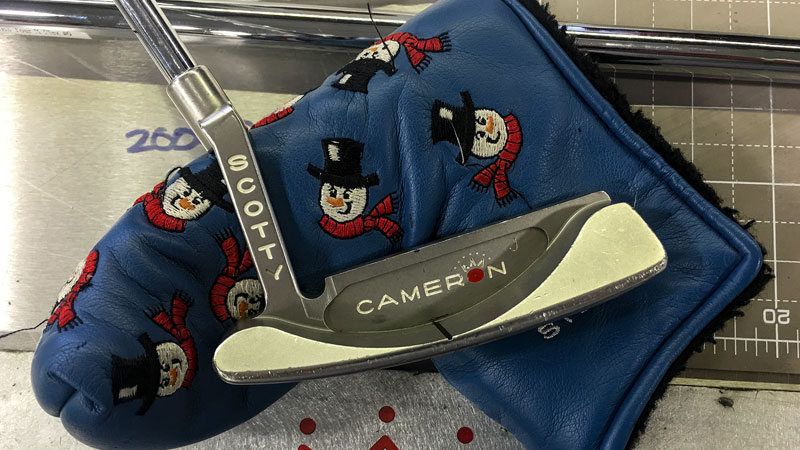Studio Stainless Laguna 2.5 with a classic 2003 Dancing Snowman headcover.