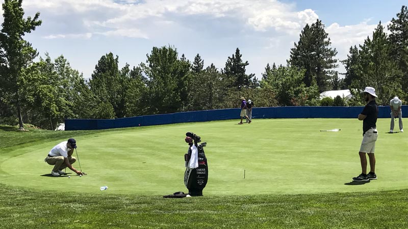 Titleist FPL player Cameron Tringale on the practice green.