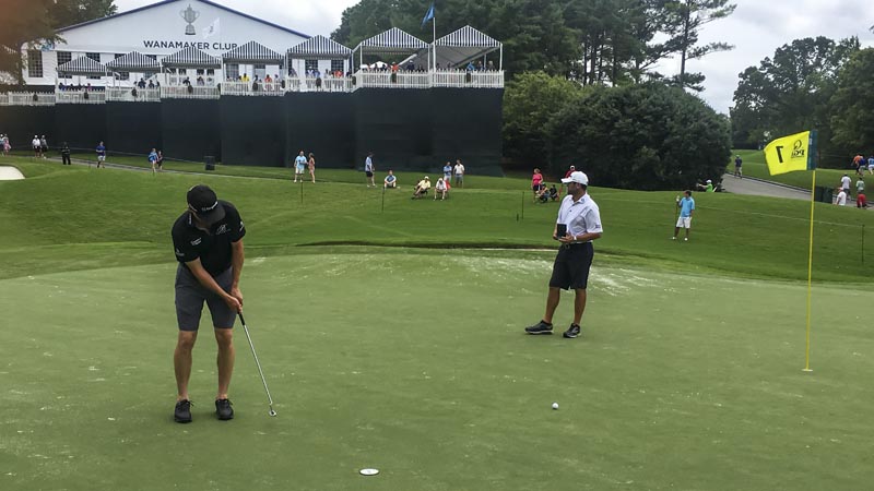 The defending champ, Jimmy Walker, taking some practice.