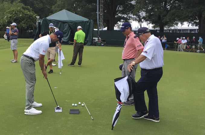 Adam Scott on the practice surface.