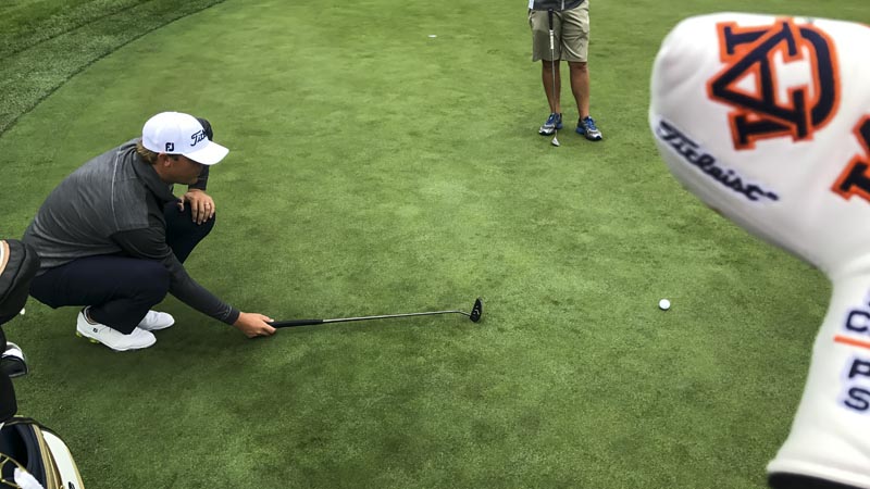Auburn alum Patton Kizzire on the practice putting surface at TPC Boston.