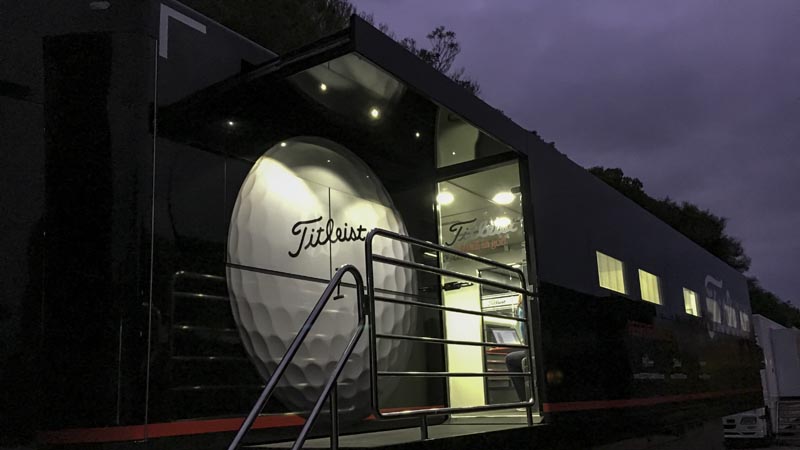 Lights on in the Titleist Tour Support Vehicle (TTSV).