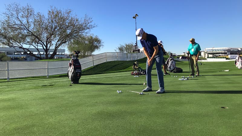 Morgan Hoffmann on the practice green.