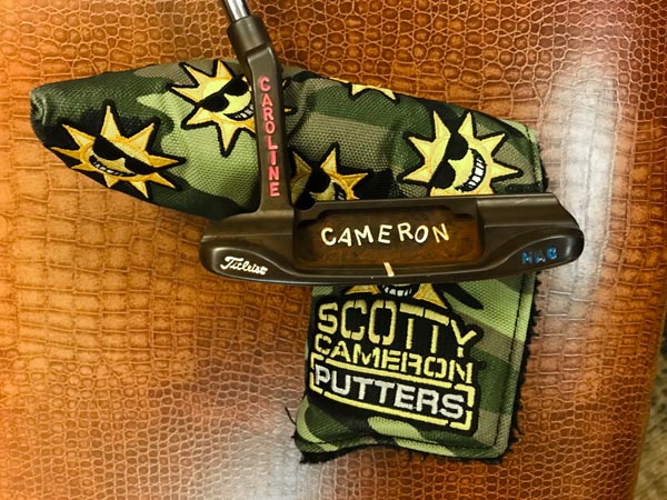 Well-gamed Newport Tour putter with our Custom Shop Limited Sunshine Camo headcover.