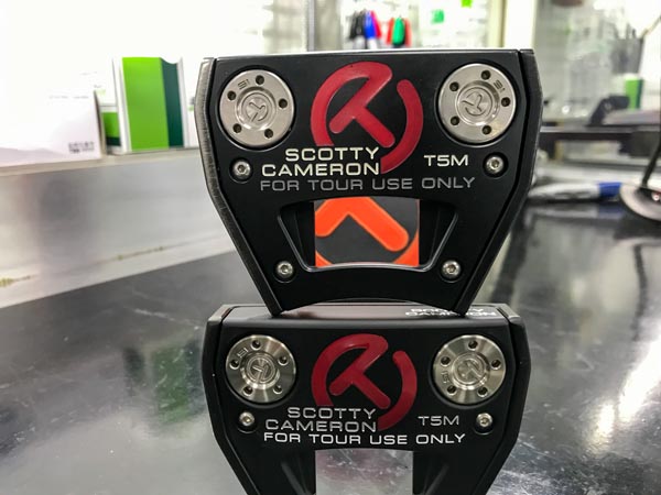 Tour Only Futura T5M putters, stacked.