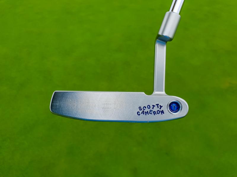 A hand-stamped dancing Scotty Cameron.