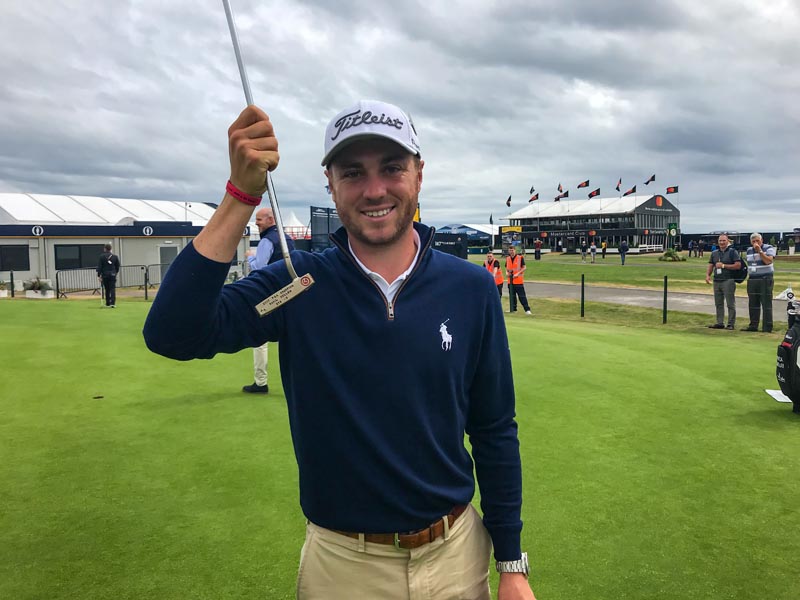 Justin Thomas with a putter Scotty made for him commemorating his 2017 PGA Championship victory.