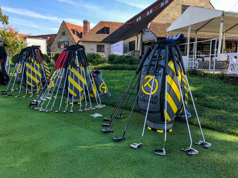Our staff bags displaying our lineup of Scotty Cameron Fine Milled Putters.