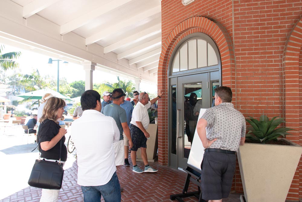 Fans wait patiently for the Gallery doors to open.