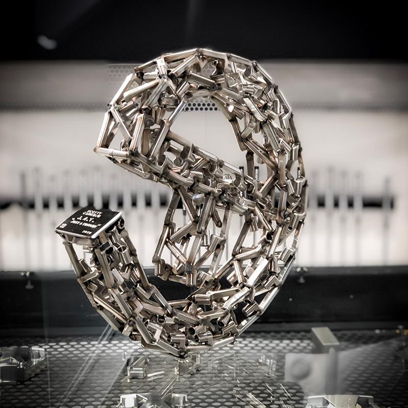 Scotty's Circle T sculpture crafted from welded putter necks.