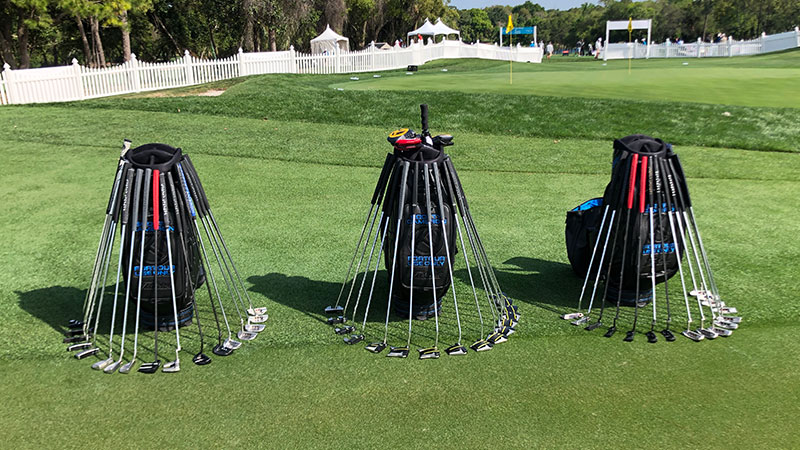 Our staff bags with fine milled Scotty Cameron Tour putters.