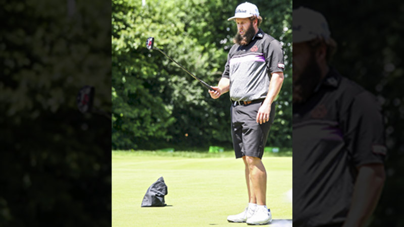 Andrew "Beef" Johnston lines it up.