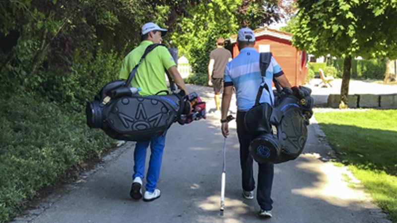 Our reps heading to the course with Scotty Cameron Tour putters.