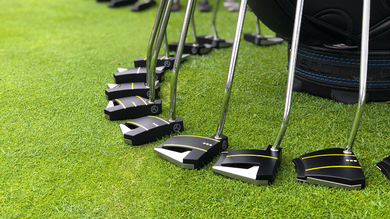 Circle T Phantom X Prototypes lined up on the practice green.