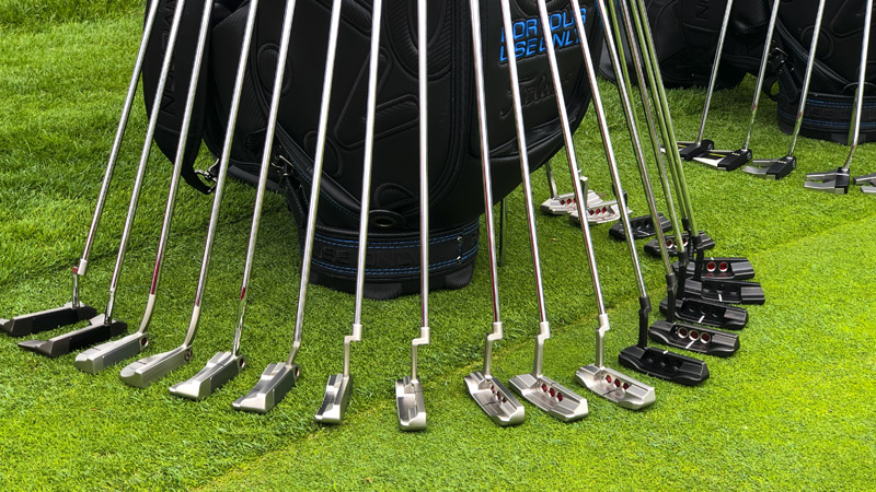Prototype blades lined up on the practice green.