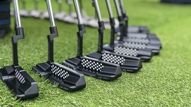 T22 Tour Only putters on the practice green.