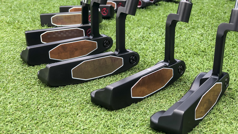 Teryllium T22 putters on Tour, one with a custom sight dot.