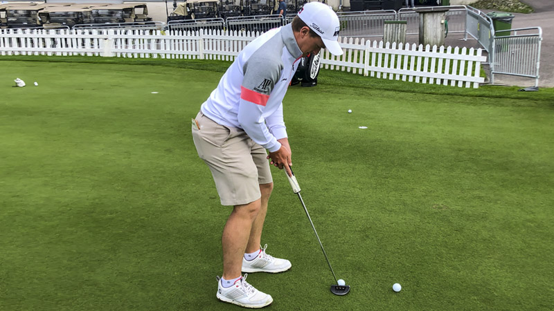 Paul Dunne on the practice green.