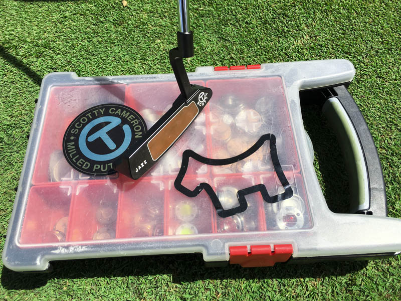 Our tour rep's gear box full of replacement sole weights with a sweet Newport 2 Button Back in view.
