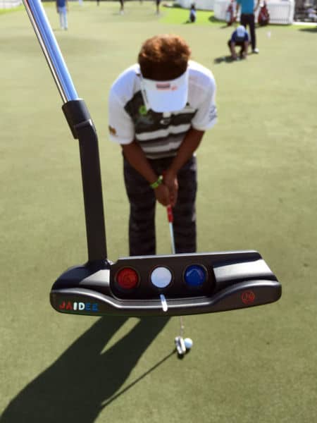 Thongchai Jaidee at work with one of his putters, a Newport Long Neck, in focus.