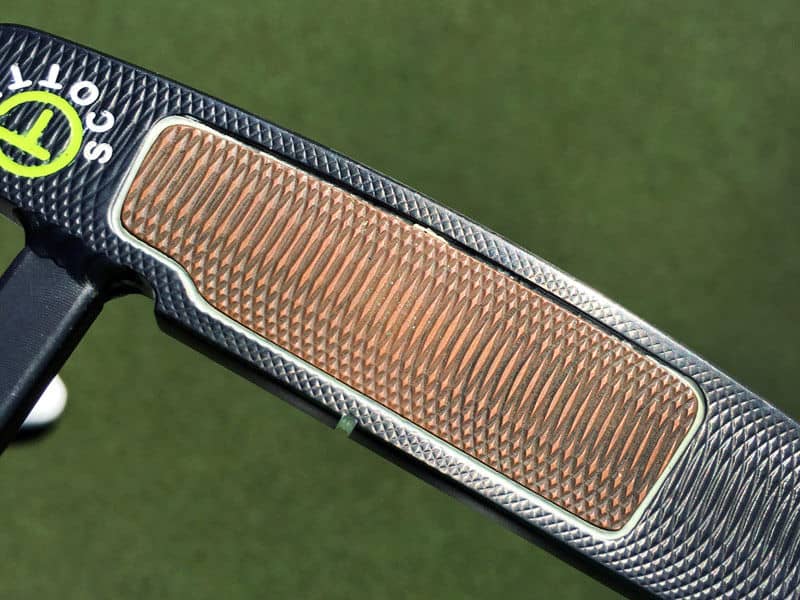 The deep milled Teryllium insert of Brett Rumford's Button Back.
