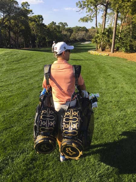 Kevin Na's caddy, Kenny Harms, helping with our Scotty Cameron staff bags.