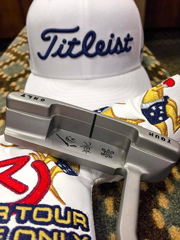 Tour gear: Scotty Cameron Newport 2 GSS, Circle T Aussie headcover and a Titleist Tour hat.