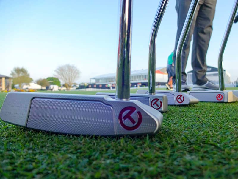 New Select Tour putters on the practice surface at Bay Hill.