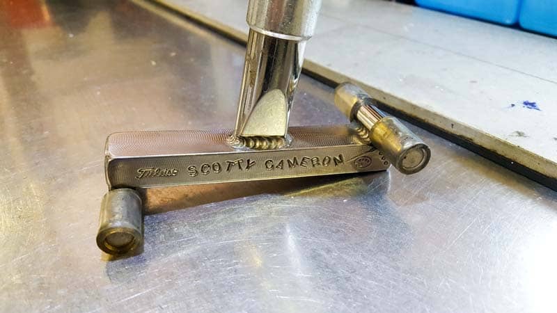 Custom putter bending tool in the Titleist Tour Van.