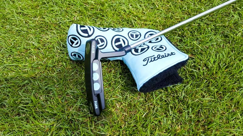 Notice the tungsten sole weights Scotty added to this Newport 2 Tour Prototype.