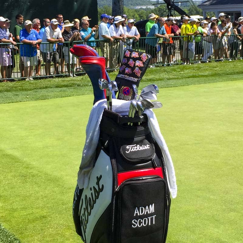 Adam Scott's staff bag with his Circle T U.S. Flag headcover at the ready.