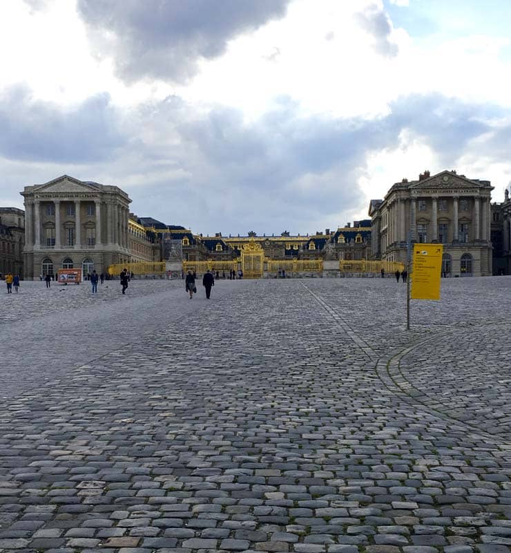 The golden gate of Versailles Palace, France.