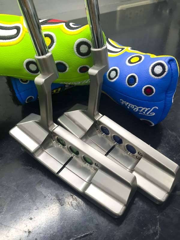 A pair of sweet new 2016 Select Concept 2 Tour putters.