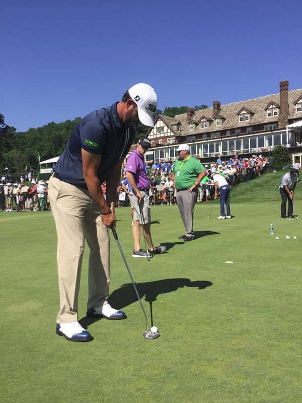 Titleist FPL Scott Piercy getting in some final putts before the season's final major gets underway.