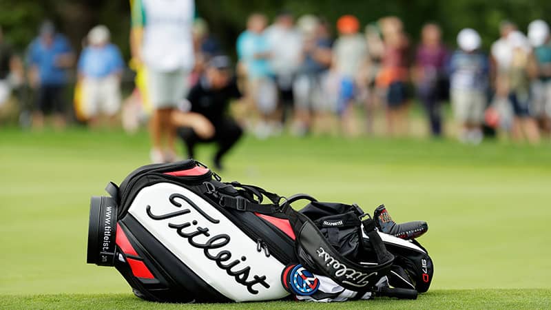 Notice the Scotty Cameron putting disks on Jimmy's Titleist staff bag.