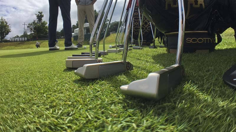 Ground level view of our Scotty Cameron staff bag and Tour putters.