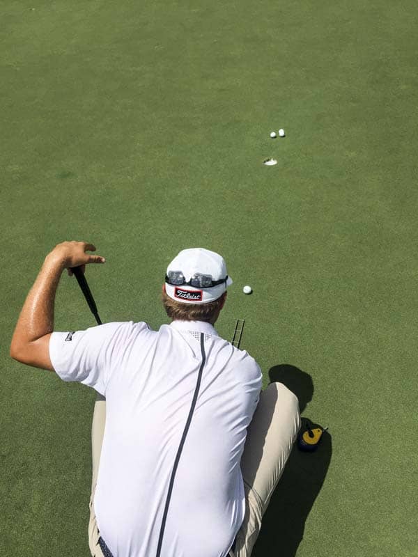 Working on his line.