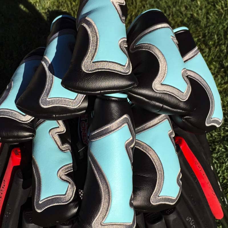Industrial Scotty Dog headcovers, all lined up.