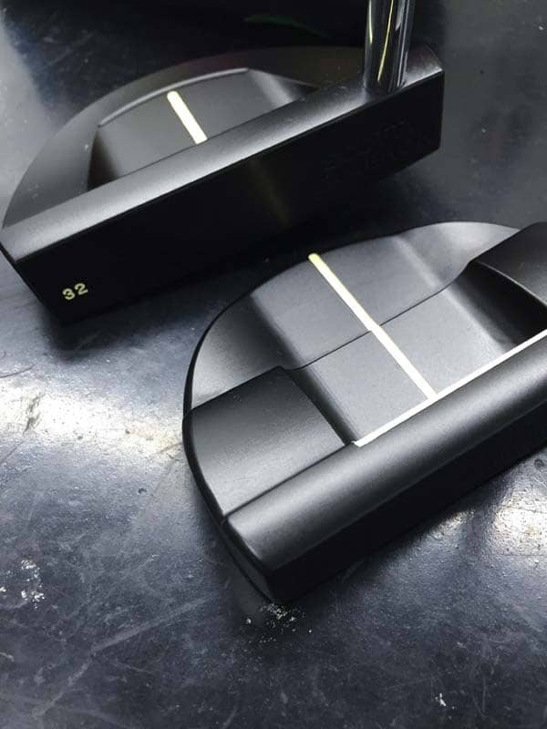 Tour Only GoLo 5 next to a Tour Only Select Roundback in Tour Black.