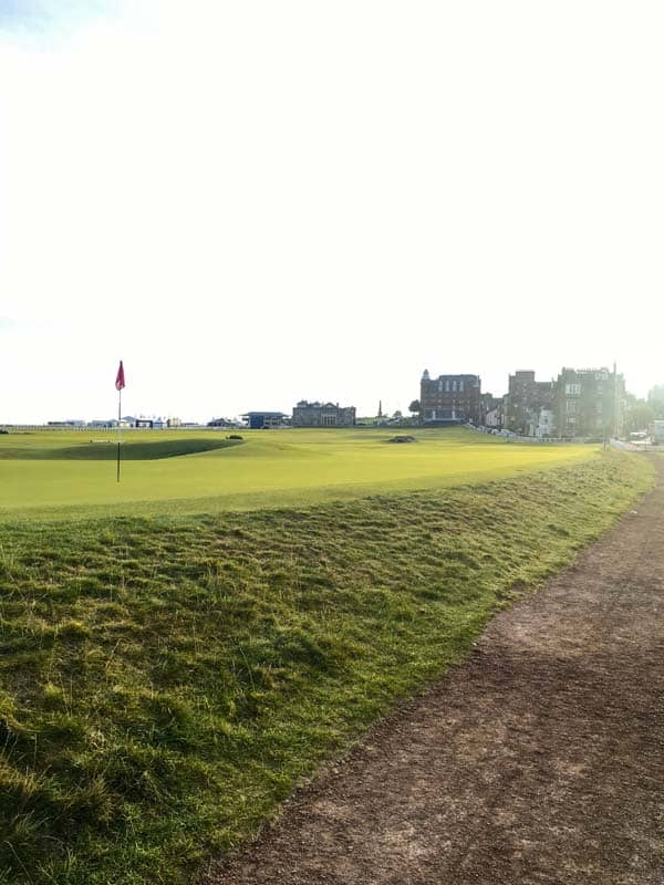 The famous Swilcan Bridge can be seen in the distance.