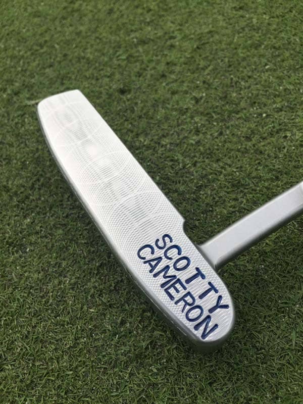 Big, bold stamping on a Scotty Cameron Tour 009.