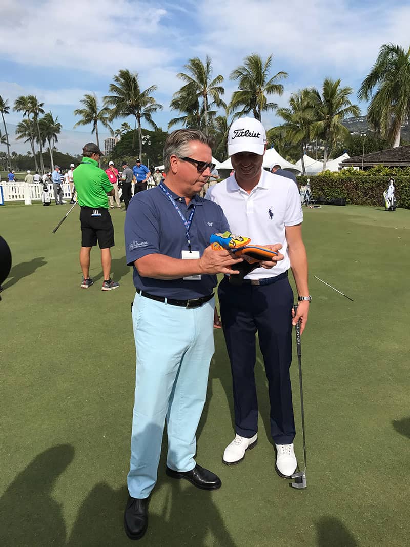 SBS Tournament of Champions winner Justin Thomas with his Futura X5 and Scotty on the green at the Sony Open.