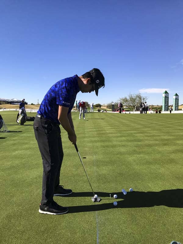 Kevin Na working with a T5S.