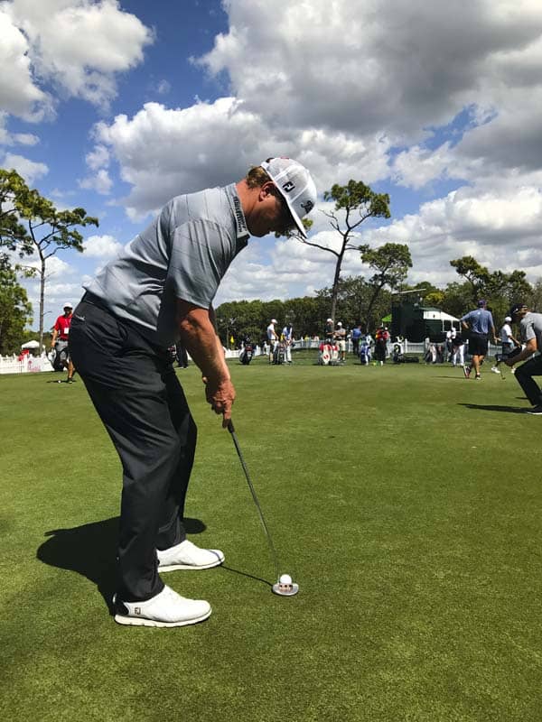 Charley Hoffman on the practice green with his Scotty Cameron Golo 5 prototype.