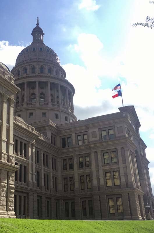 The granite and marble structure has a large rotunda and dome plus House and Senate chambers.