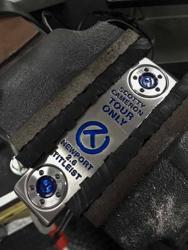 Vise with rubber grips for protection.